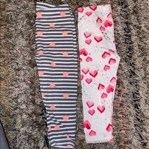 2 pairs of heart print leggings